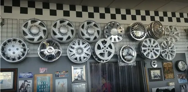 Wall of hubcaps for cars, trucks, vans and SUVs at Hub Cap Annie